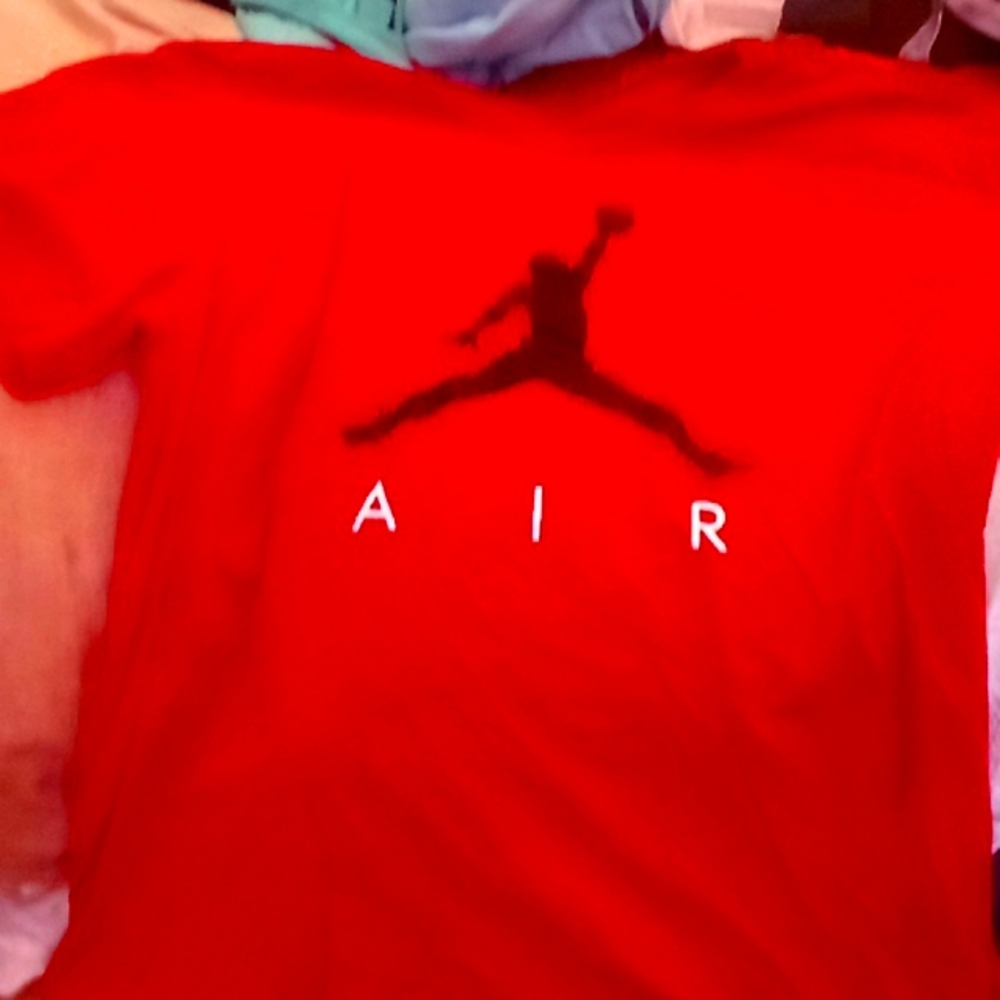 Lightly used Nike Air Jordan logo red and black,Size XL,Retails for around $39.